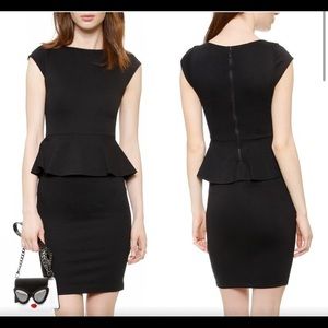 Alice and Olivia mini black dress fitted with peplum detail.